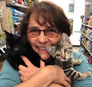 Eileen holding her kittens.